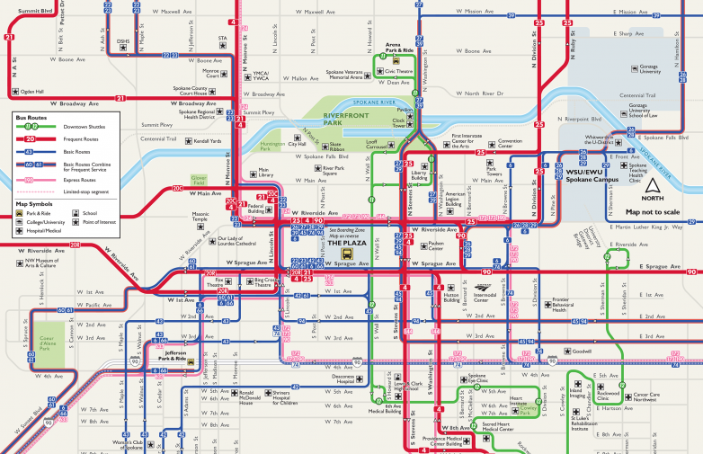 Alt text: detailed Spokane transit map showing various bus and train routes in the city, marked in colors like red, blue, and green, with notable landmarks and streets labeled.