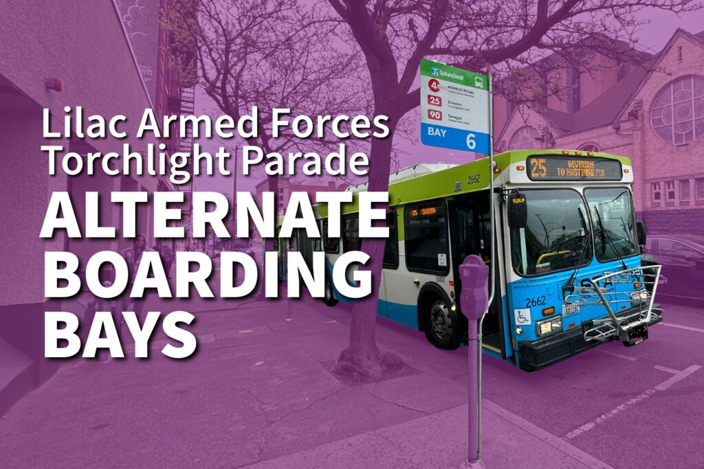 STA bus at temporary stop with "Alternate Boarding Bays" sign for Lilac Armed Forces Torchlight Parade.