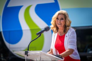 A close-up shot of EWU President Shari McMahan speaking at the podium.