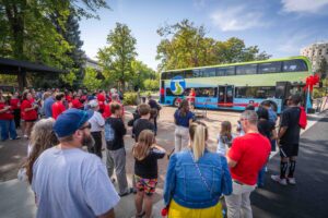 A wide shot of the event from the back of the crowd.