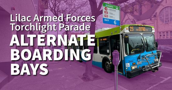 STA bus at temporary stop with "Alternate Boarding Bays" sign for Lilac Armed Forces Torchlight Parade.